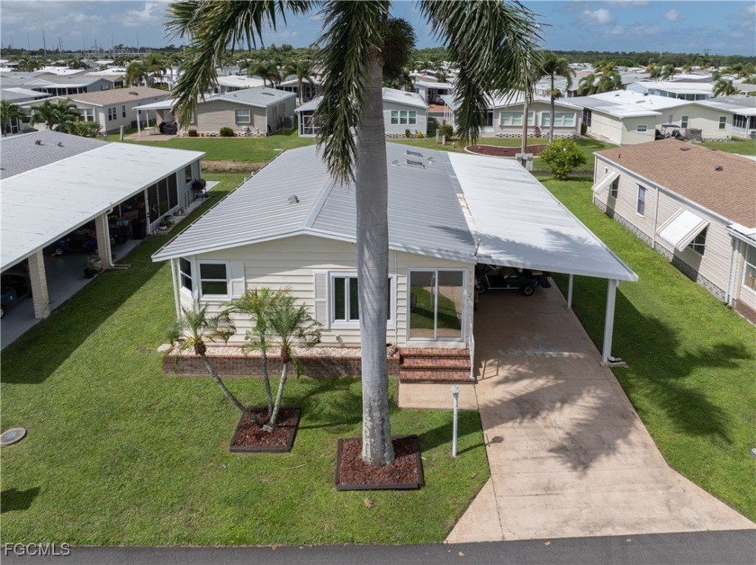 Welcome Home to Tamiami Village 55+! This well-maintained - Beach Home for sale in North Fort Myers, Florida on Beachhouse.com
