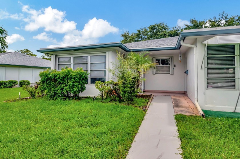 Step into this stunning 2-bedroom, 2-bathroom villa, where - Beach Condo for sale in Delray Beach, Florida on Beachhouse.com