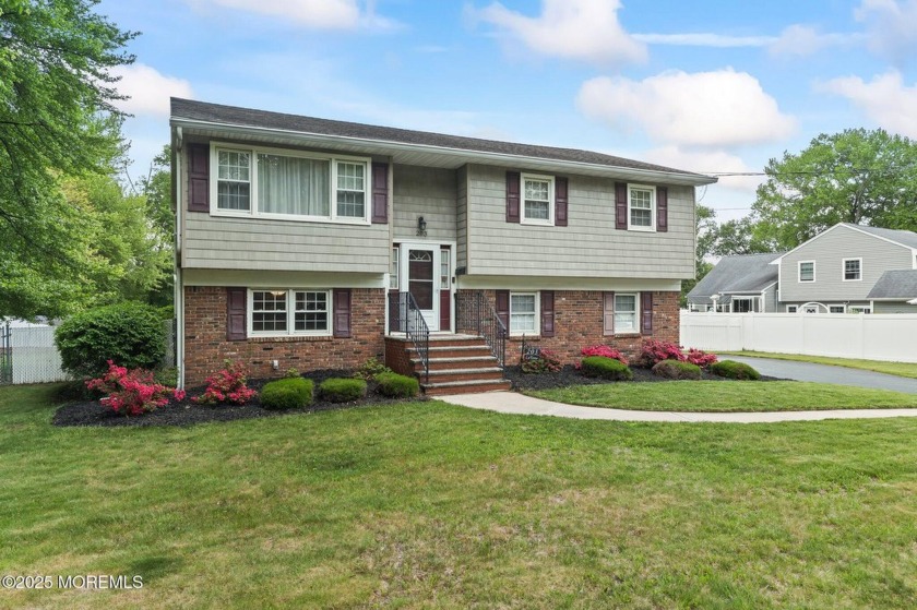 Welcome to this beautifully maintained bi-level home nestled in - Beach Home for sale in Middletown, New Jersey on Beachhouse.com