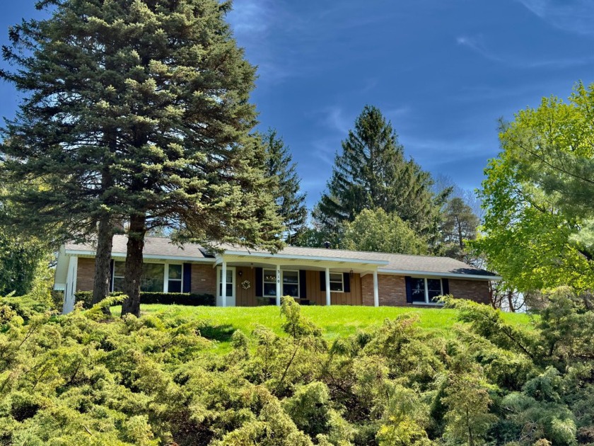 Live the Lakeside Lifestyle! Picture yourself unwinding in your - Beach Home for sale in Shelby, Michigan on Beachhouse.com