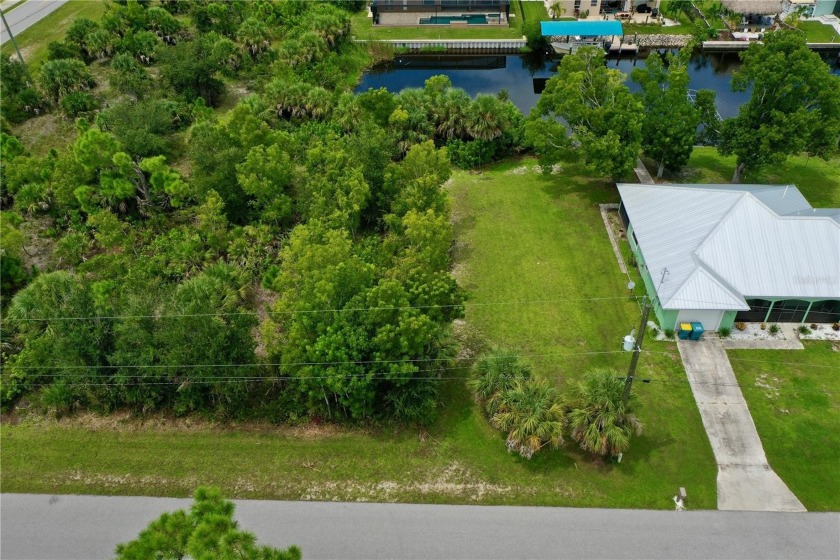 Prime location for this 80 x 125 buildable, canal lot, with Gulf - Beach Lot for sale in Port Charlotte, Florida on Beachhouse.com