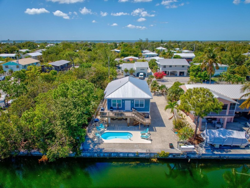 Located in Big Pine Key, this 3-bedroom, 2-bathroom, canal front - Beach Home for sale in Big Pine Key, Florida on Beachhouse.com