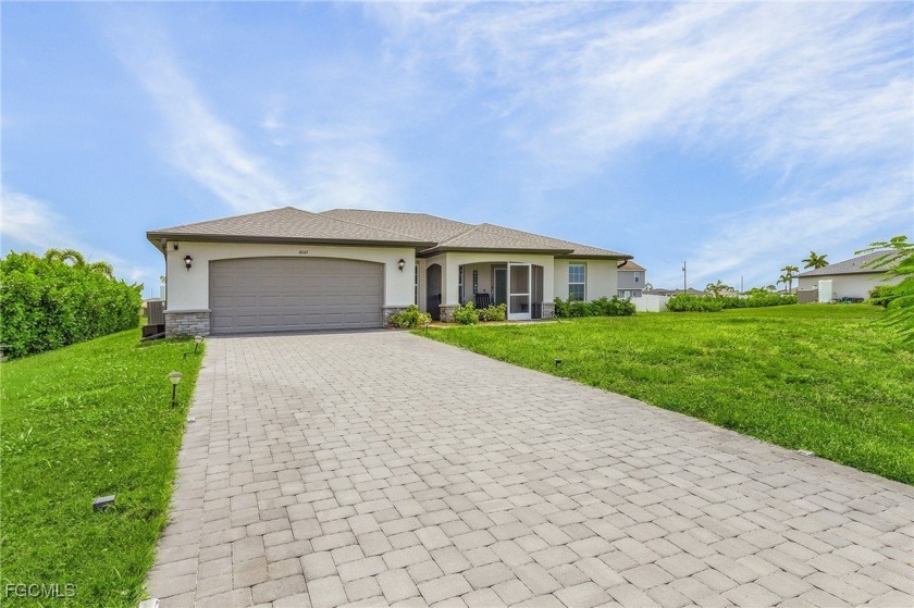 Welcome to this gorgeous home nestled in the tranquil NW Cape - Beach Home for sale in Cape Coral, Florida on Beachhouse.com