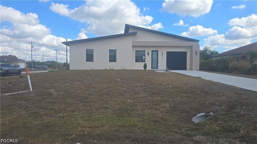 New Construction 3 Beds 3 Baths property in a CORNER LOT at a - Beach Home for sale in Lehigh Acres, Florida on Beachhouse.com