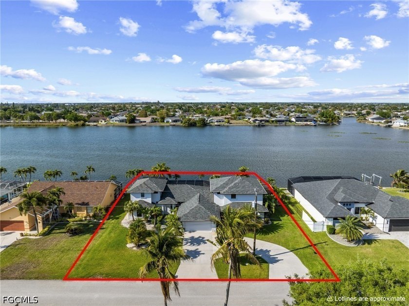 Set on an oversized 0.34-acre (15,000 sq. ft.) lot with lush - Beach Home for sale in Cape Coral, Florida on Beachhouse.com