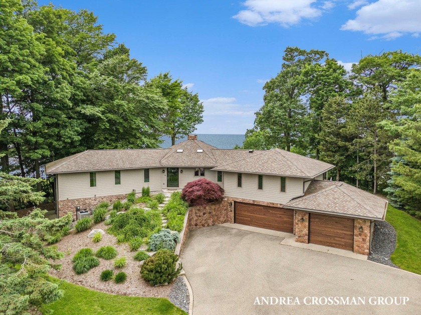 Take in breathtaking Lake Michigan views from this expertly - Beach Home for sale in Holland, Michigan on Beachhouse.com