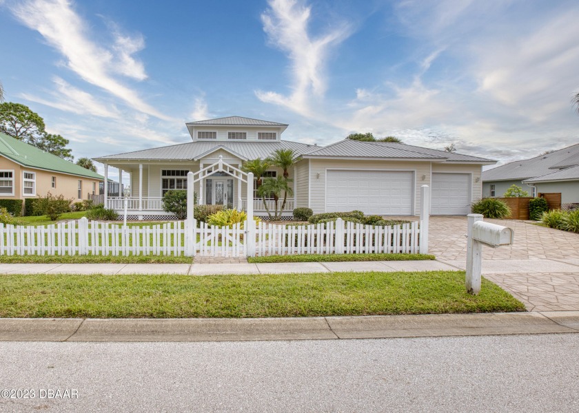 Gorgeous Two-Story Waterfront Retreat with Dock, Pool, and 3-Car - Beach Home for sale in New Smyrna Beach, Florida on Beachhouse.com