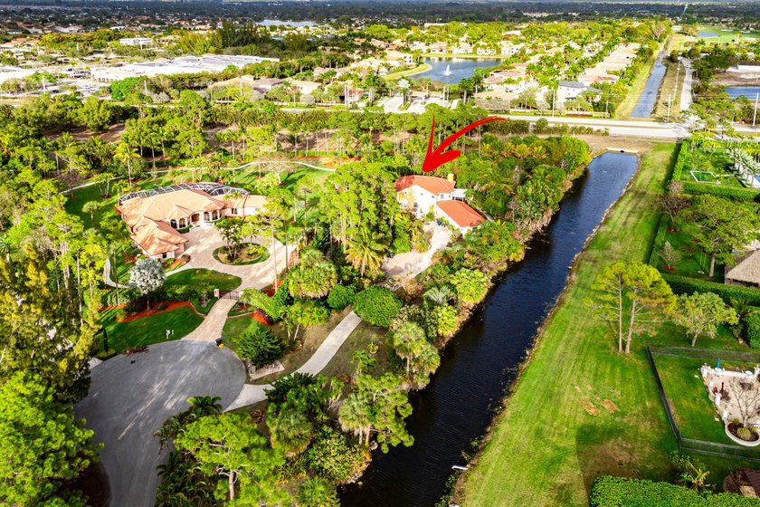 Welcome to this extraordinary, custom-built, estate home nestled - Beach Home for sale in Lake Worth, Florida on Beachhouse.com