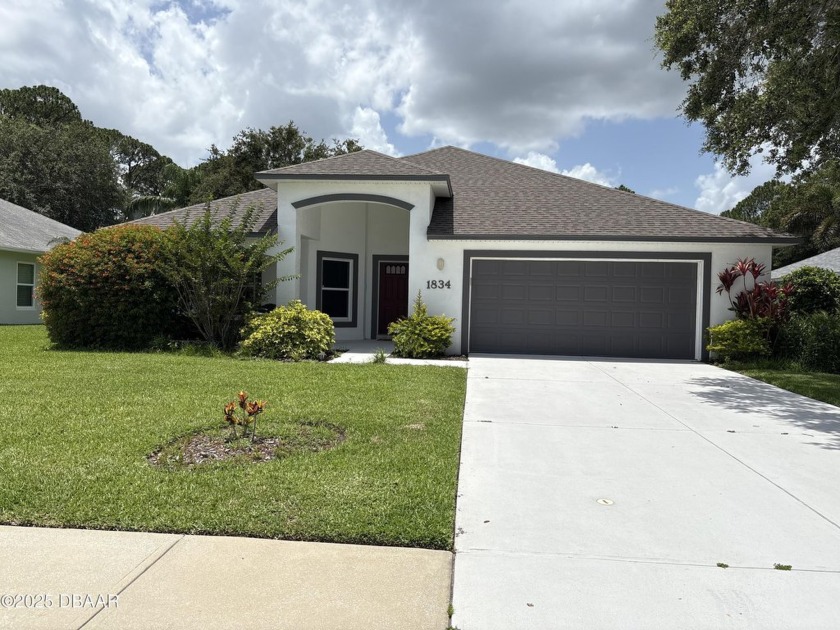 This Johnson-built block home is move in ready, located in the - Beach Home for sale in New Smyrna Beach, Florida on Beachhouse.com