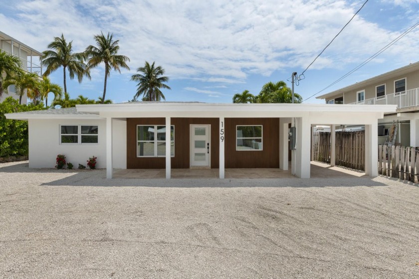 Welcome to your dream home in the heart of Islamorada! This - Beach Home for sale in Lower Matecumbe Key, Florida on Beachhouse.com