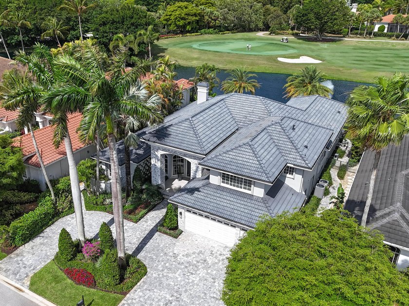 Updated luxury estate home showcasing panoramic golf & water - Beach Home for sale in Palm Beach Gardens, Florida on Beachhouse.com