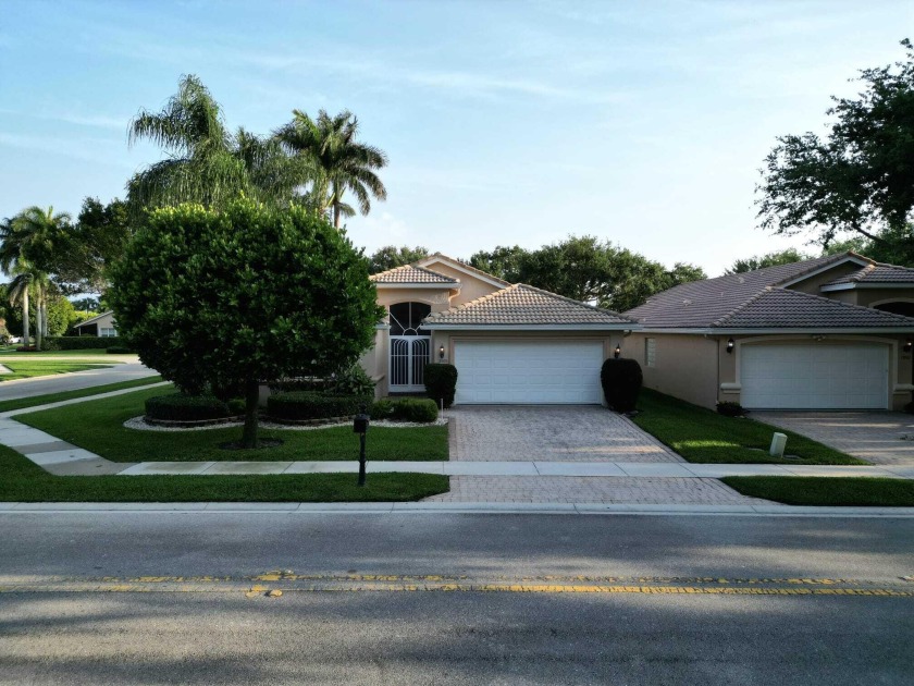 Positioned on a prestigious corner lot, this three-bedroom home - Beach Home for sale in Delray Beach, Florida on Beachhouse.com