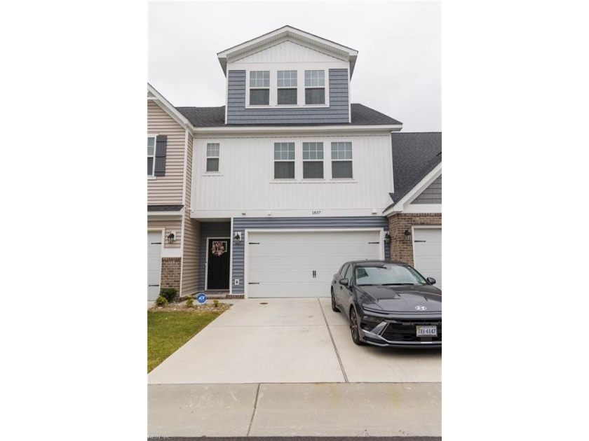 Welcome to your dream home in the highly sought-after Grassfield - Beach Townhome/Townhouse for sale in Chesapeake, Virginia on Beachhouse.com