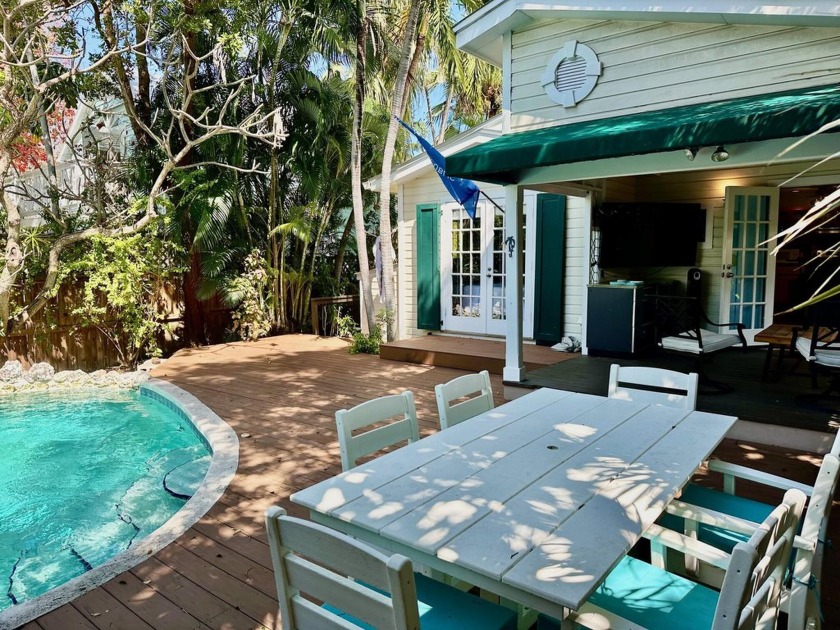Behind the quintessential white picket fence you will find this - Beach Home for sale in Key West, Florida on Beachhouse.com