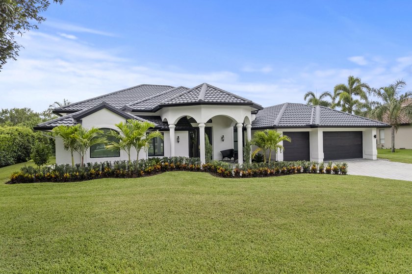 Welcome to 1340 SW Squire Johns lane, a beautifully remodeled 4 - Beach Home for sale in Palm City, Florida on Beachhouse.com
