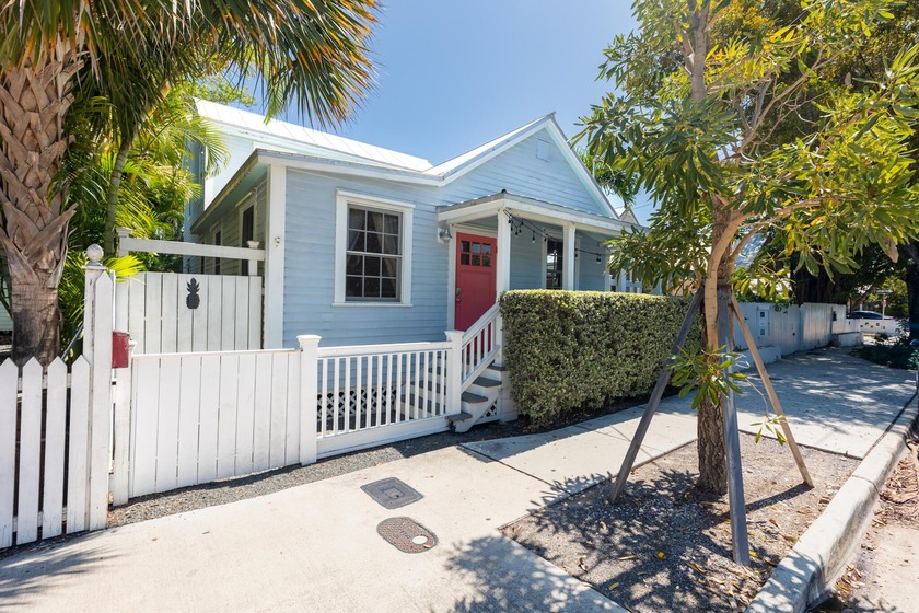 Step into the charm of this beautifully designed two-story Conch - Beach Home for sale in Key West, Florida on Beachhouse.com