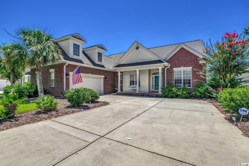 This spectacular home is located inside the gates of Leatherleaf - Beach Home for sale in North Myrtle Beach, South Carolina on Beachhouse.com