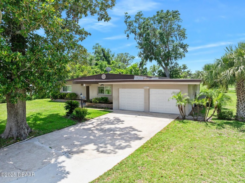 This meticulously maintained three-bedroom solid block home is - Beach Home for sale in Ormond Beach, Florida on Beachhouse.com