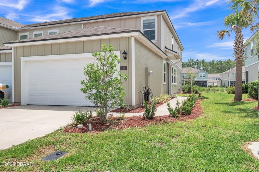 Welcome home to 144 Redbud Rd, where modern comfort meets - Beach Home for sale in Palm Coast, Florida on Beachhouse.com