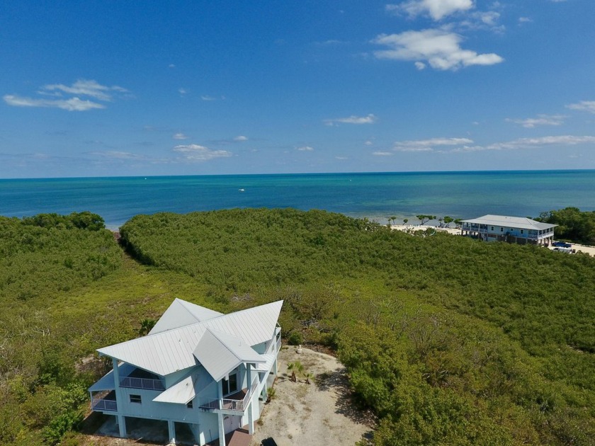 Truly rare find with ocean views in a park like setting.  Where - Beach Home for sale in Key Largo, Florida on Beachhouse.com