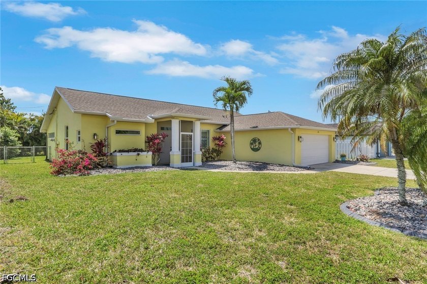 Beautiful 4-bedroom, 2-bath pool home in a desirable SE Cape - Beach Home for sale in Cape Coral, Florida on Beachhouse.com