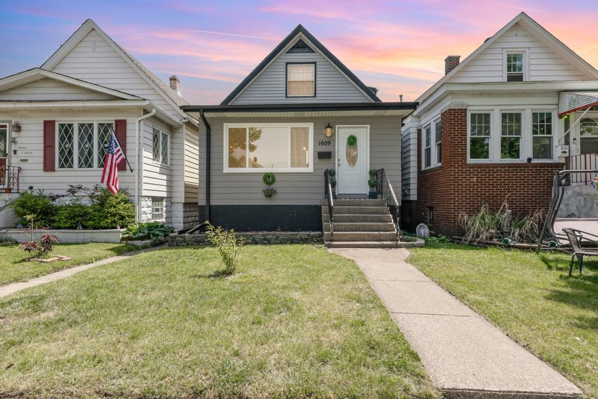 Stunningly updated with it's original character maintained, this - Beach Home for sale in Whiting, Indiana on Beachhouse.com