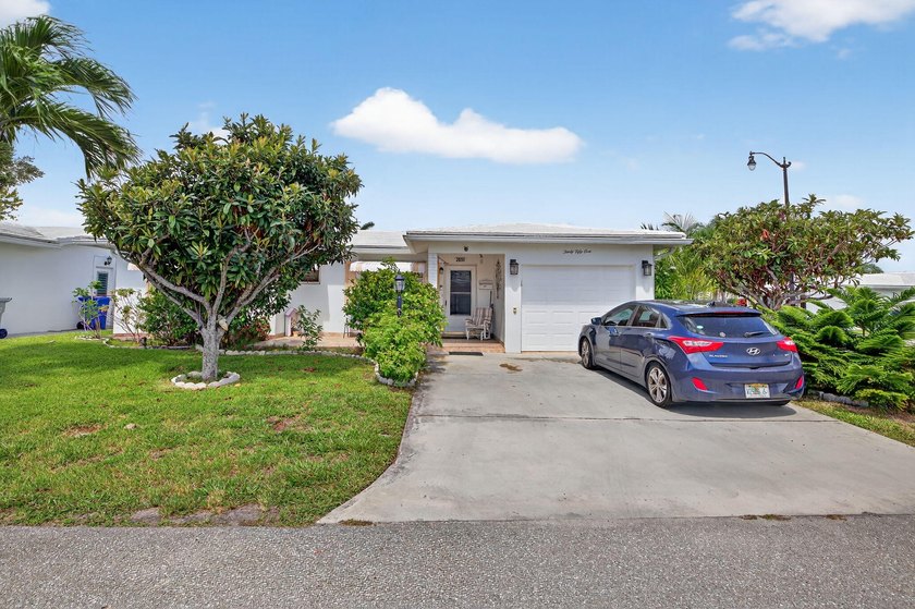 Welcome to this inviting 2/2 corner home, perfectly situated on - Beach Home for sale in Pompano Beach, Florida on Beachhouse.com