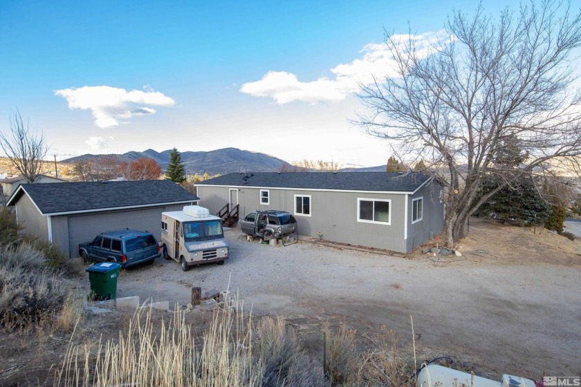 Nestled on a private 1.1-acre lot, this property offers a - Beach Home for sale in Reno, Nevada on Beachhouse.com