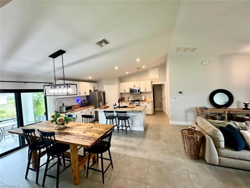 Stunning 2021-built concrete block home featuring modern - Beach Home for sale in Lehigh Acres, Florida on Beachhouse.com
