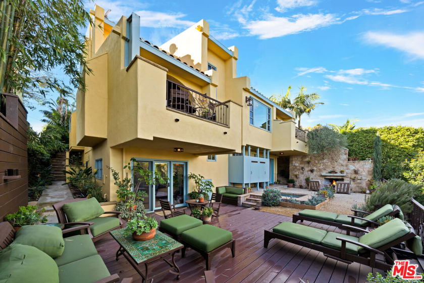 This designer-perfect Latigo Canyon escape is located in central - Beach Home for sale in Malibu, California on Beachhouse.com