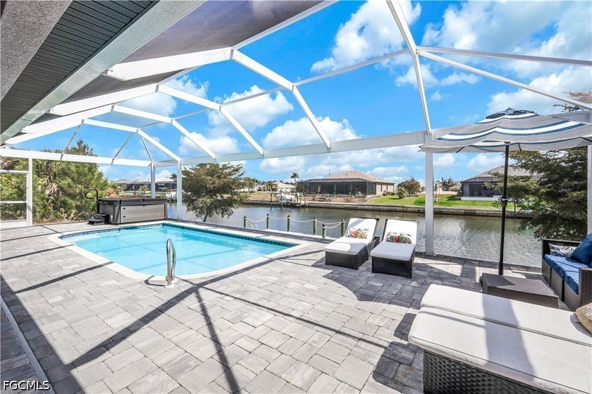 This 4-bed single family home in NW Cape Coral that features - Beach Home for sale in Cape Coral, Florida on Beachhouse.com