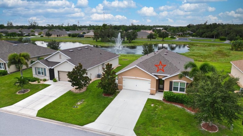 LAKEFRONT HOME WITH PRIVATE FOUNTAIN VIEWS in Waterford Estates! - Beach Home for sale in Punta Gorda, Florida on Beachhouse.com