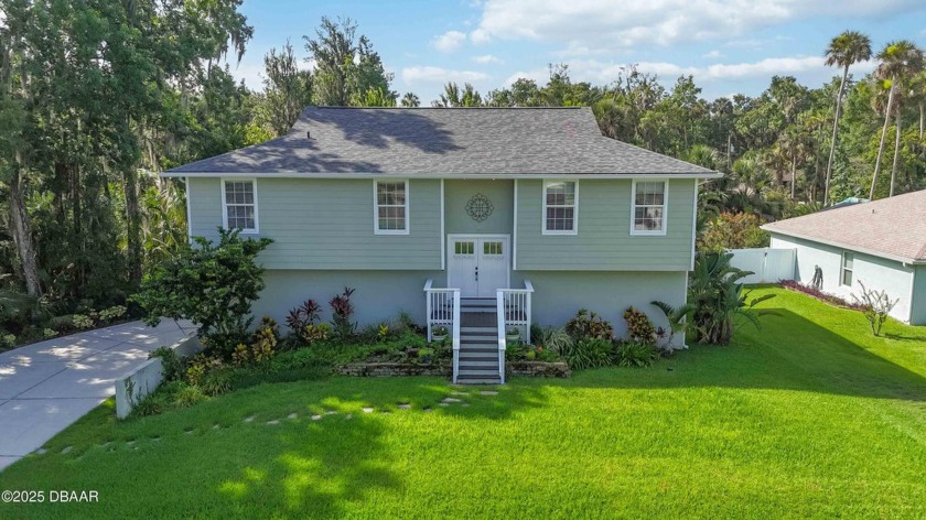 This beautifully updated 3 bedroom, 3 bathroom pool home - Beach Home for sale in New Smyrna Beach, Florida on Beachhouse.com