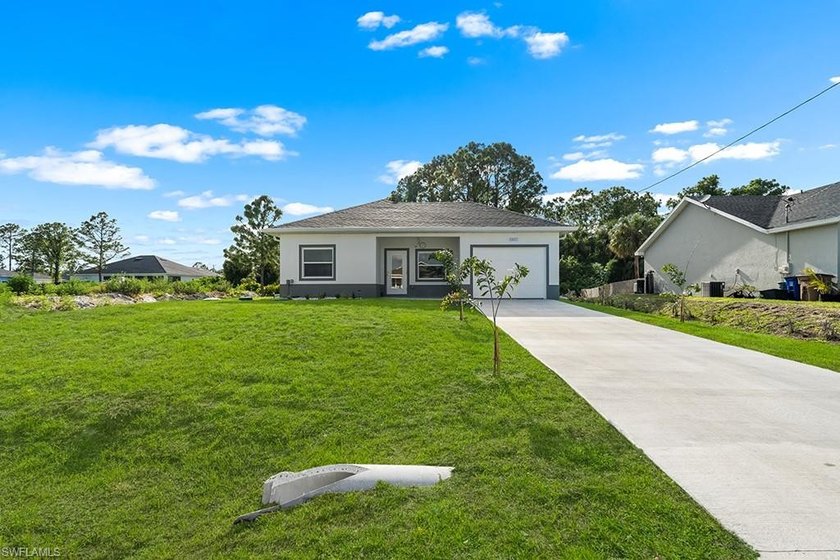 Motivated Seller!! Welcome to this brand-new construction home - Beach Home for sale in Lehigh Acres, Florida on Beachhouse.com