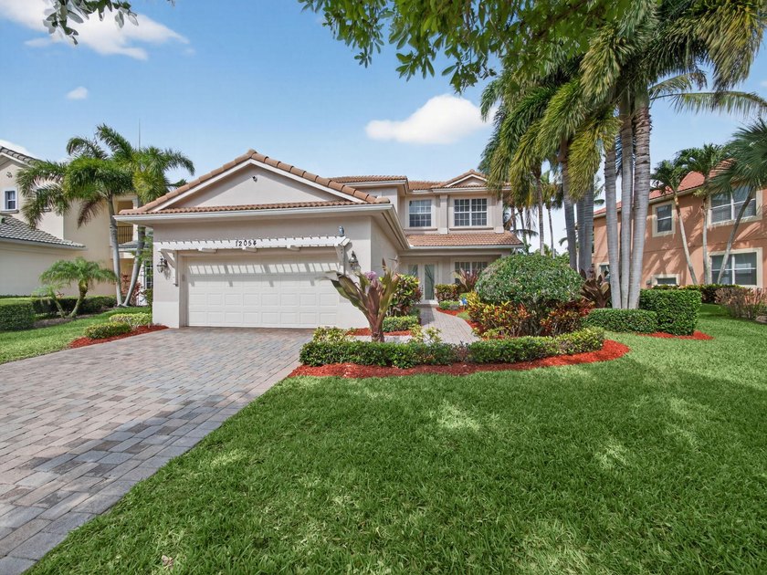Welcome to 12054 Aviles Circle! A 5 bed 4.5 bath lakefront pool - Beach Home for sale in Palm Beach Gardens, Florida on Beachhouse.com