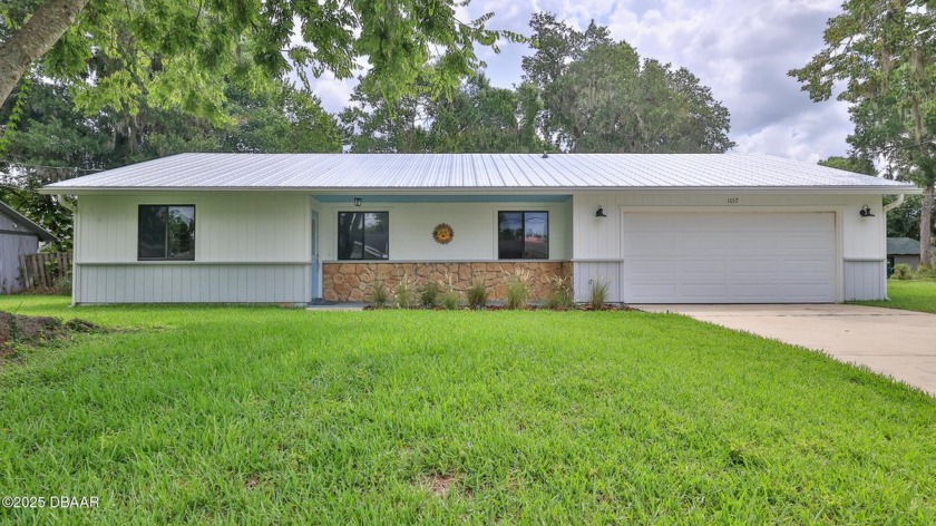 Discover a welcoming single family home on a quiet tree-lined - Beach Home for sale in Holly Hill, Florida on Beachhouse.com