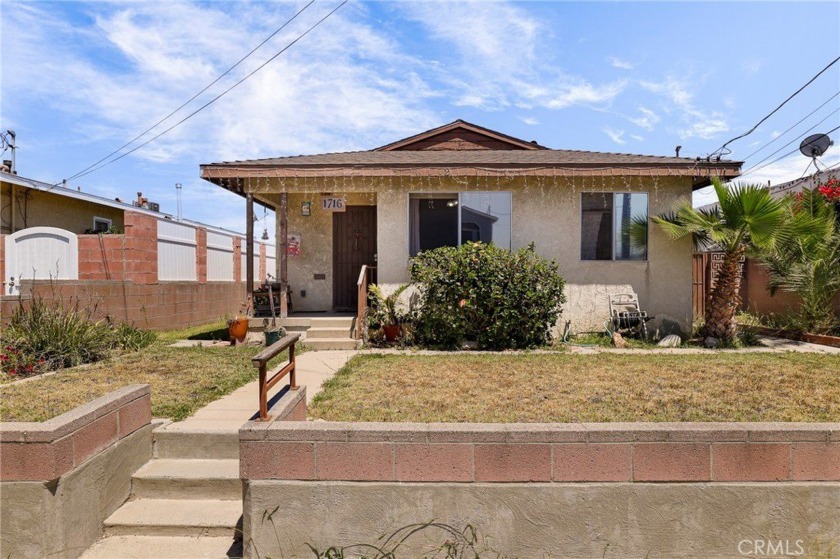 Endless Potential in Prime West Wilmington! This 3-bedroom - Beach Home for sale in Wilmington, California on Beachhouse.com