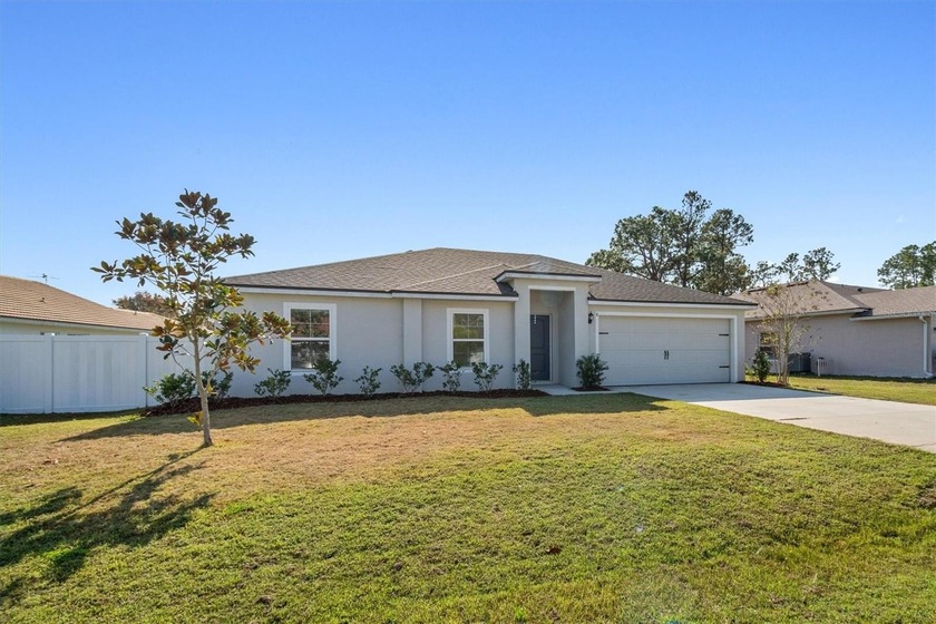 Welcome to this beautifully maintained 3-bedroom, 2-bath home - Beach Home for sale in Palm Coast, Florida on Beachhouse.com