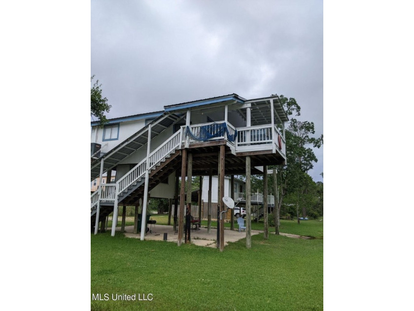 2 homes (2 house numbers) on 4 beautiful waterfronts lots !! - Beach Home for sale in Bay Saint Louis, Mississippi on Beachhouse.com
