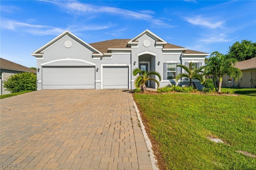 Spacious 4-Bedroom Home in Prime Cape Coral Location! Welcome to - Beach Home for sale in Cape Coral, Florida on Beachhouse.com
