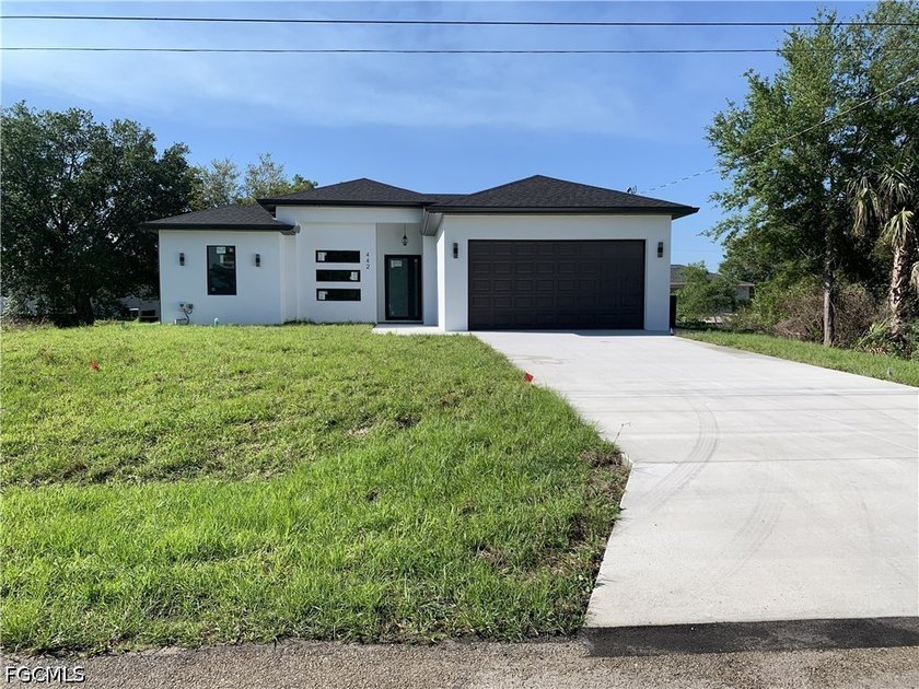Don't miss this brand-new construction home located just minutes - Beach Home for sale in Lehigh Acres, Florida on Beachhouse.com