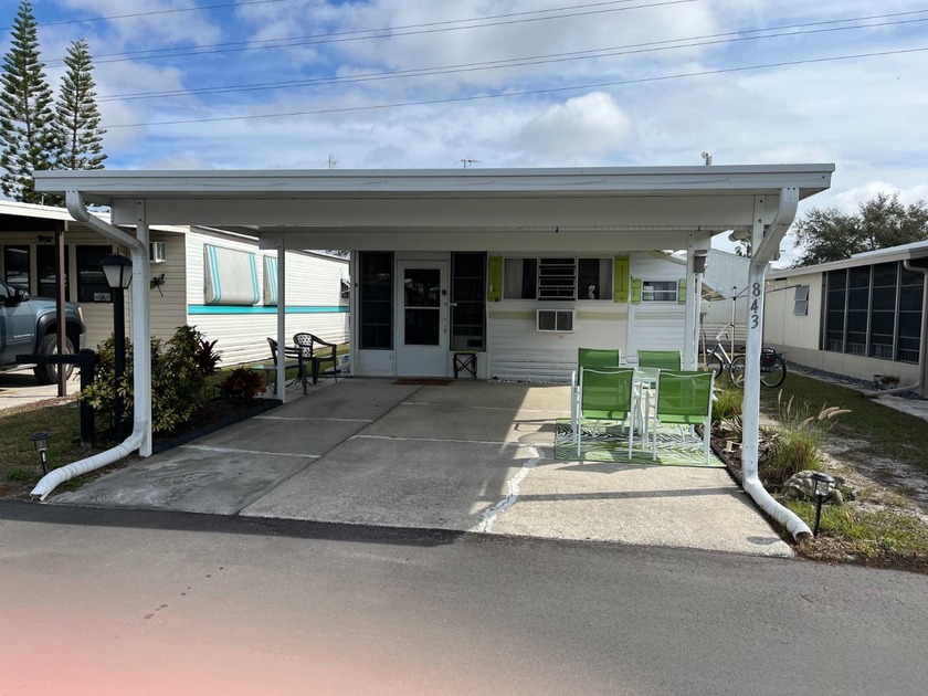 This quaint lakeside home could be your perfect seasonal or - Beach Home for sale in New Port Richey, Florida on Beachhouse.com