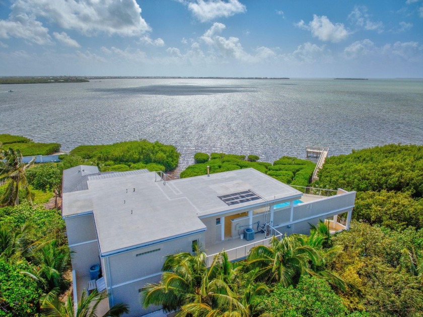 Experience the epitome of island luxury in this custom built 5 - Beach Home for sale in Cudjoe Key, Florida on Beachhouse.com