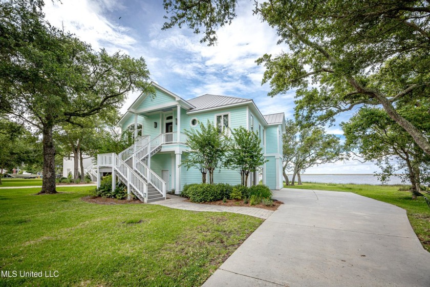 Southern Living at Its Finest - Waterfront Paradise with - Beach Home for sale in Ocean Springs, Mississippi on Beachhouse.com