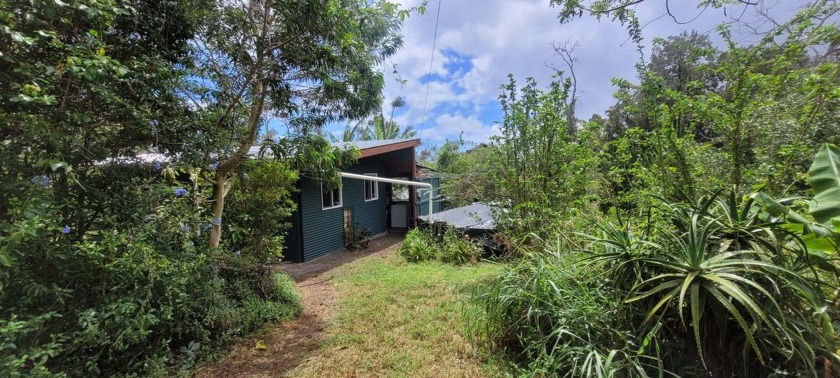 Come enjoy this beautiful, 1 acre, food forest. This property - Beach Home for sale in Ocean View, Hawaii on Beachhouse.com