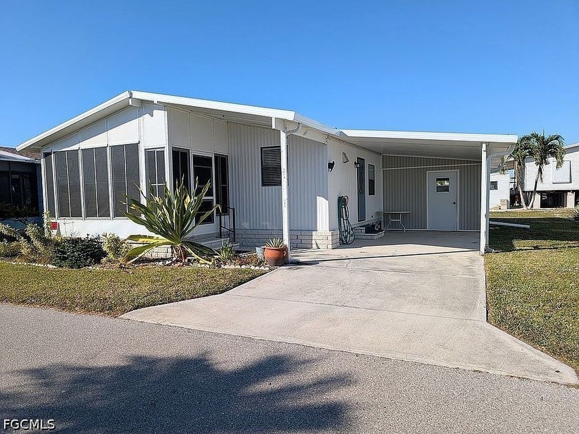 Welcome to this charming and newly refreshed home located in the - Beach Home for sale in St. James City, Florida on Beachhouse.com