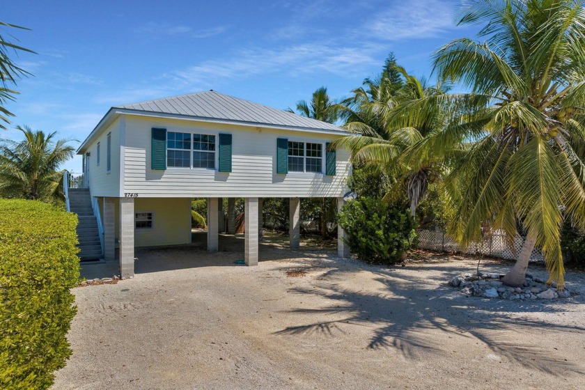 Welcome to your waterfront retreat! This custom built solid - Beach Home for sale in Ramrod Key, Florida on Beachhouse.com
