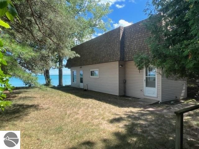 Cottage on the Shore of Lake Huron!!!  You can use this cottage - Beach Home for sale in Tawas City, Michigan on Beachhouse.com