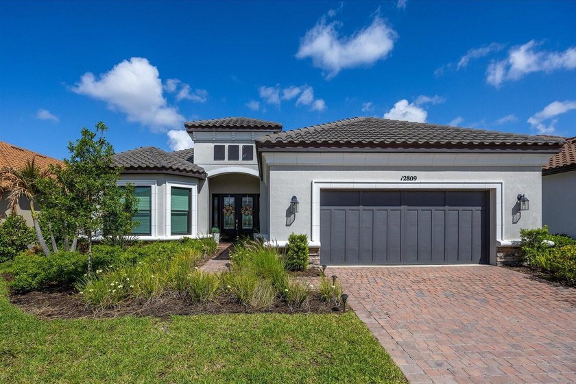 Welcome to your dream oasis at 12809 SW Barelli Ct in Port Saint - Beach Home for sale in Port Saint Lucie, Florida on Beachhouse.com