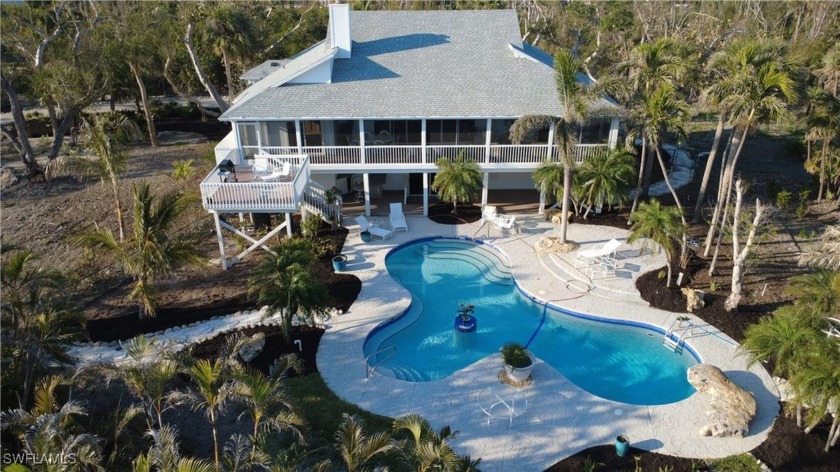 Discover this ultimate coastal sanctuary, a stunning stilt home - Beach Home for sale in Sanibel, Florida on Beachhouse.com